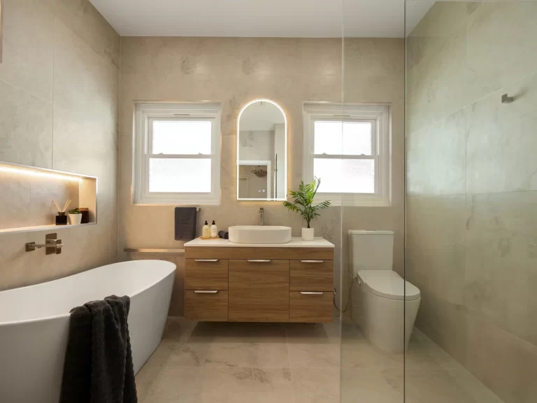 bathroom renovation- a bathroom with a sink toilet and a shower