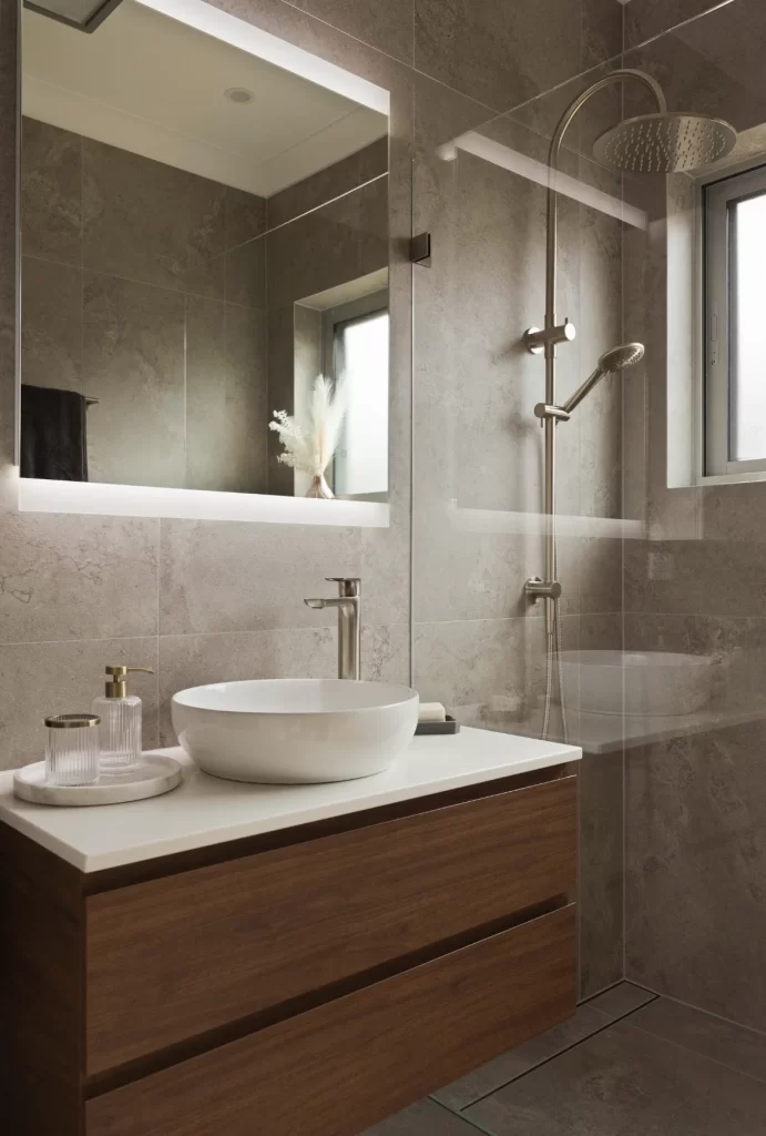 bathroom renovations near me- a bathroom with a sink and shower